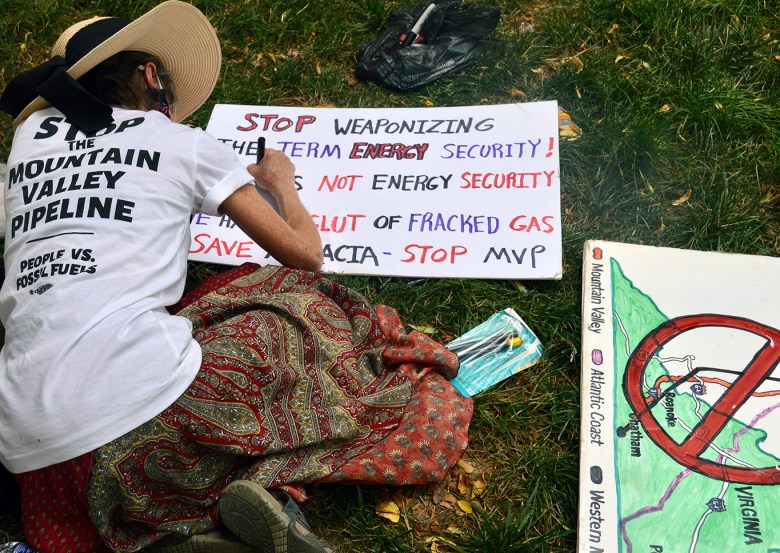 Signmaking at the MVP protest at the White House on June 8.