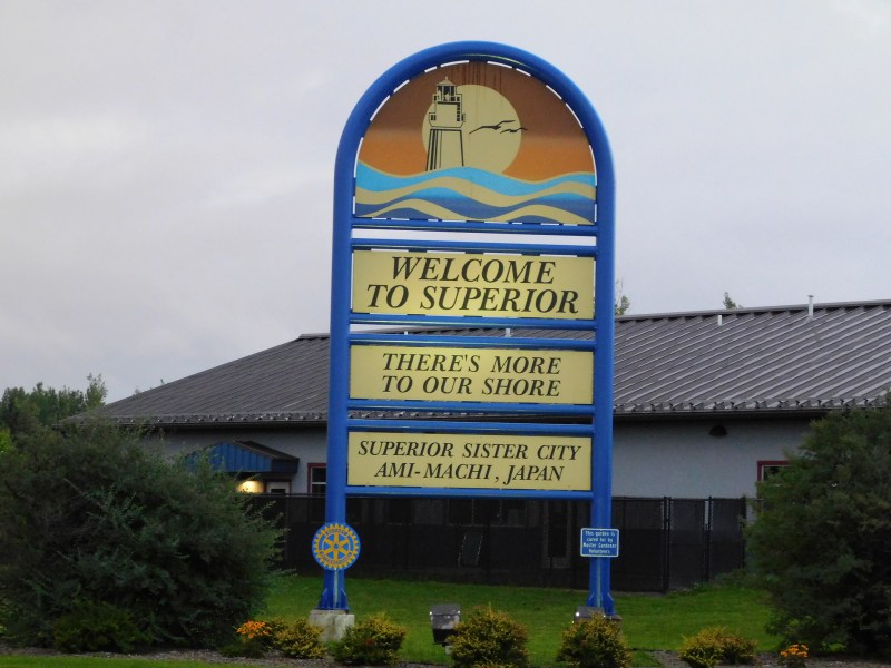 A roadside sign welcomes drivers to Superior, Wisconsin,