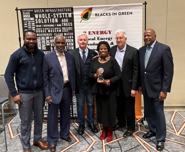 Blacks in Green's Green Energy Justice Cooperative team is pictured at the Chicago Urban League Summit in May, 2023. From left: Wasiu Adesope, Nuri Madina, David Yocca, Naomi Davis, Mark Burger and Dennis Walker.