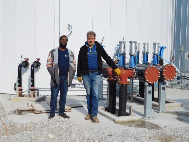 Vernon Fleming, left, former mission director of Urban Growers Collective, and Clemens Halene, head engineer for Green Arrow Engineering, at the Green Era Campus site.
