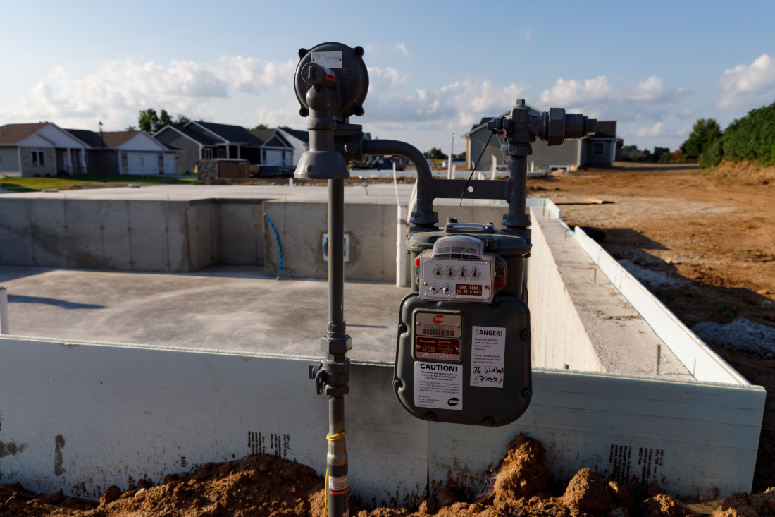A natural gas meter near the foundation of a new home under contruction.